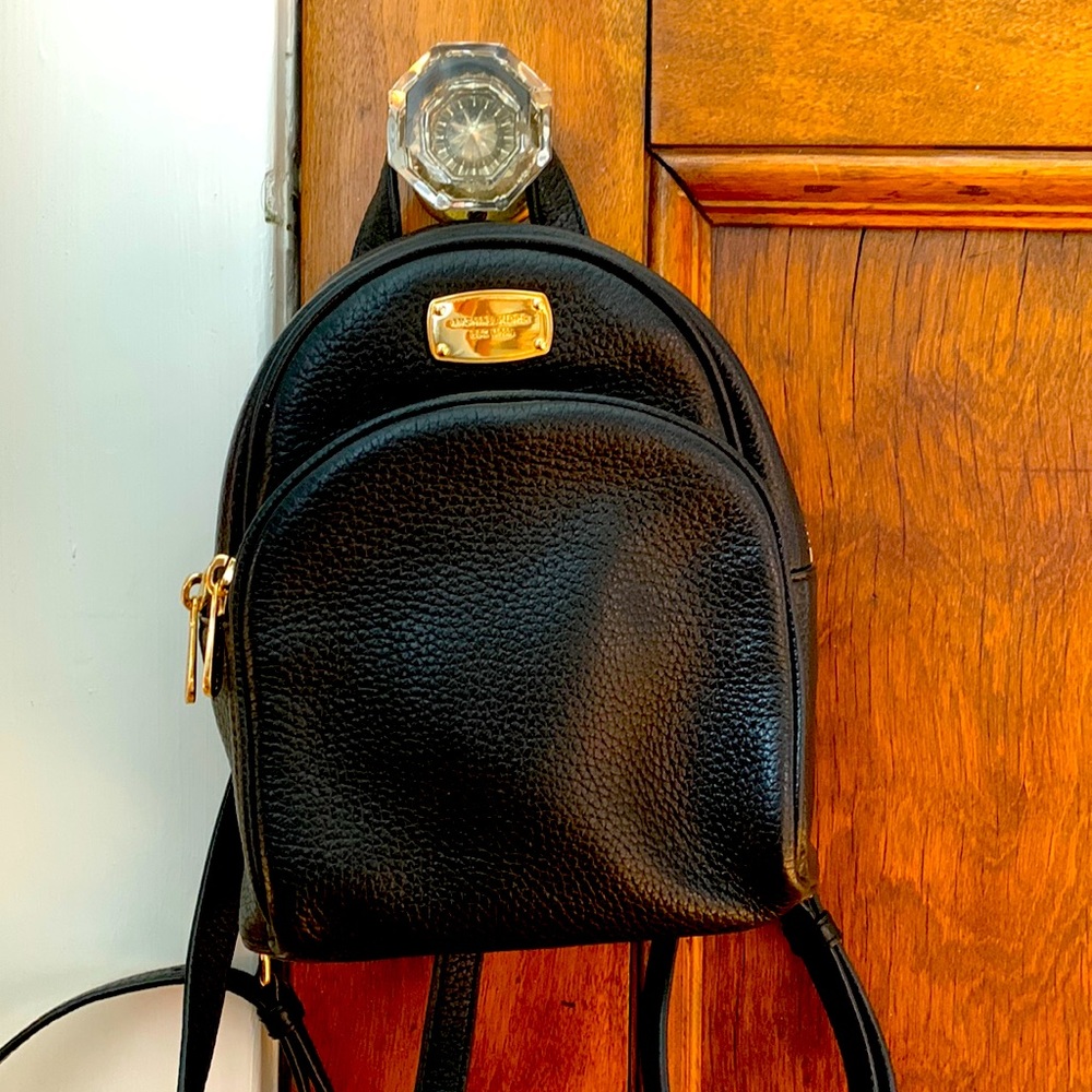micheal kors mini leather black backpack, like-new condition.